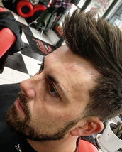 Coolfade 1.5 back and side lowfade,thinned out the edge,long spiky mess on top
