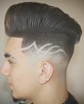 Pompadour hell Here we have a classic pompadour, with a edgy pattern to turn heads, finished with a 