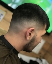 Skin fade Skin faded with textured top