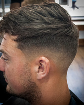 Skin fade Skin fade with long texture on top