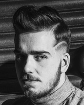 Skin faded pomp with surgical line Classic pomp skin faded and quiffed with surgical line at the sid