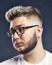 Skinfade Skin fade with a square textured look on top.